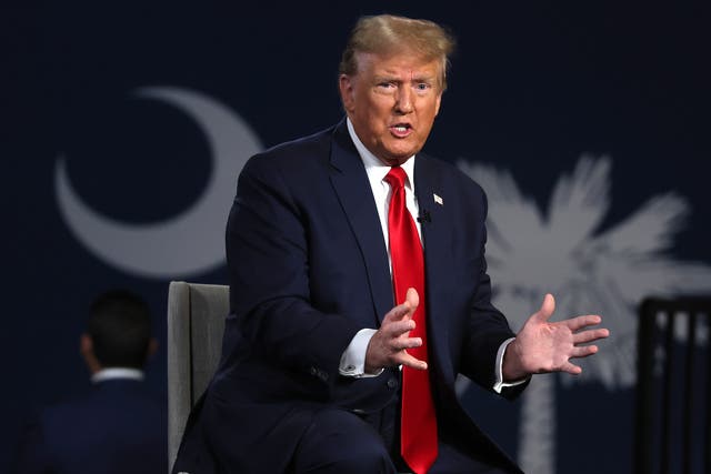 <p>Republican presidential candidate, former US President Donald Trump speaks during a Fox News town hall </p>