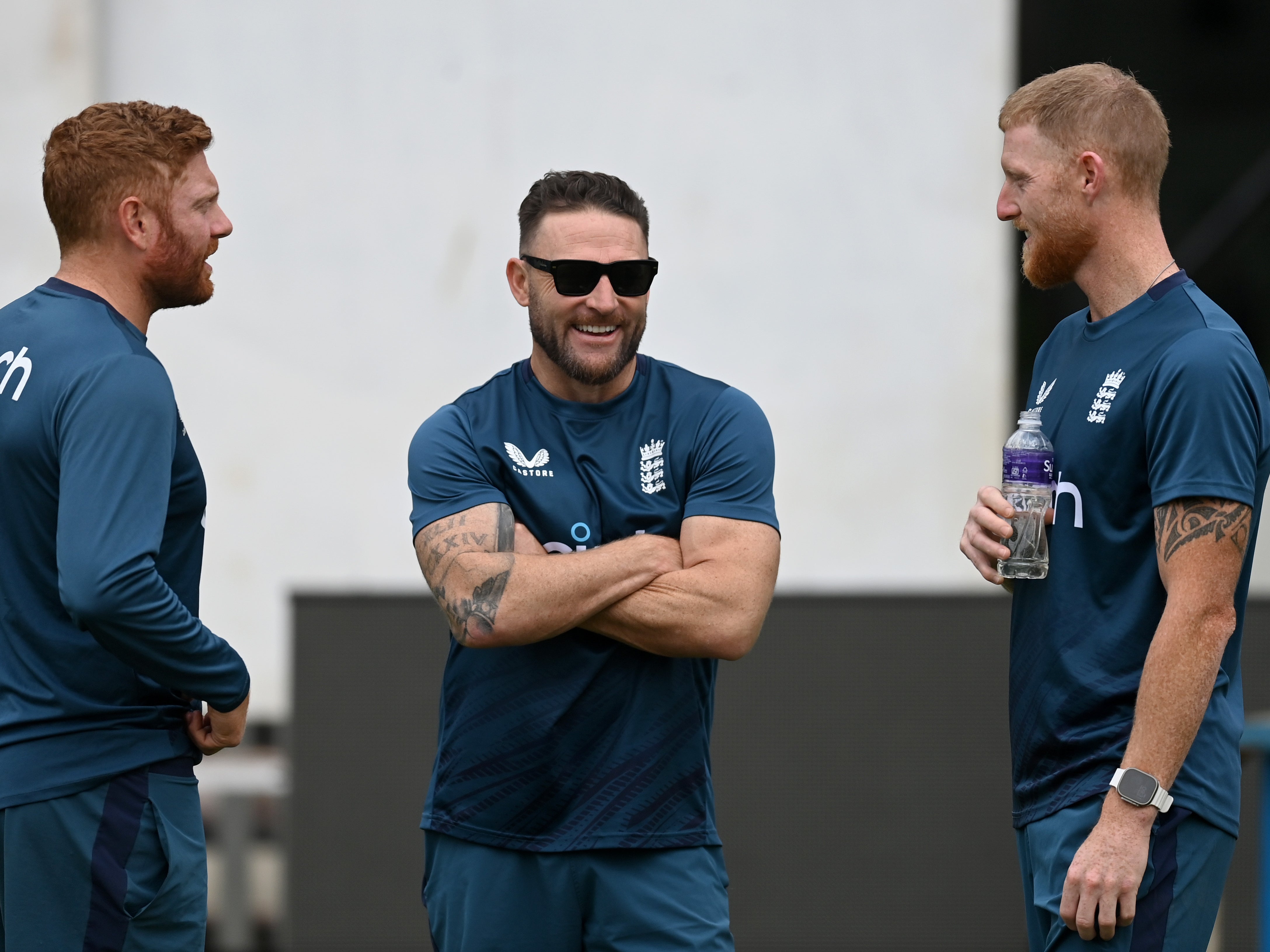 Jonathan Bairstow of England speaks with Stokes and McCullum
