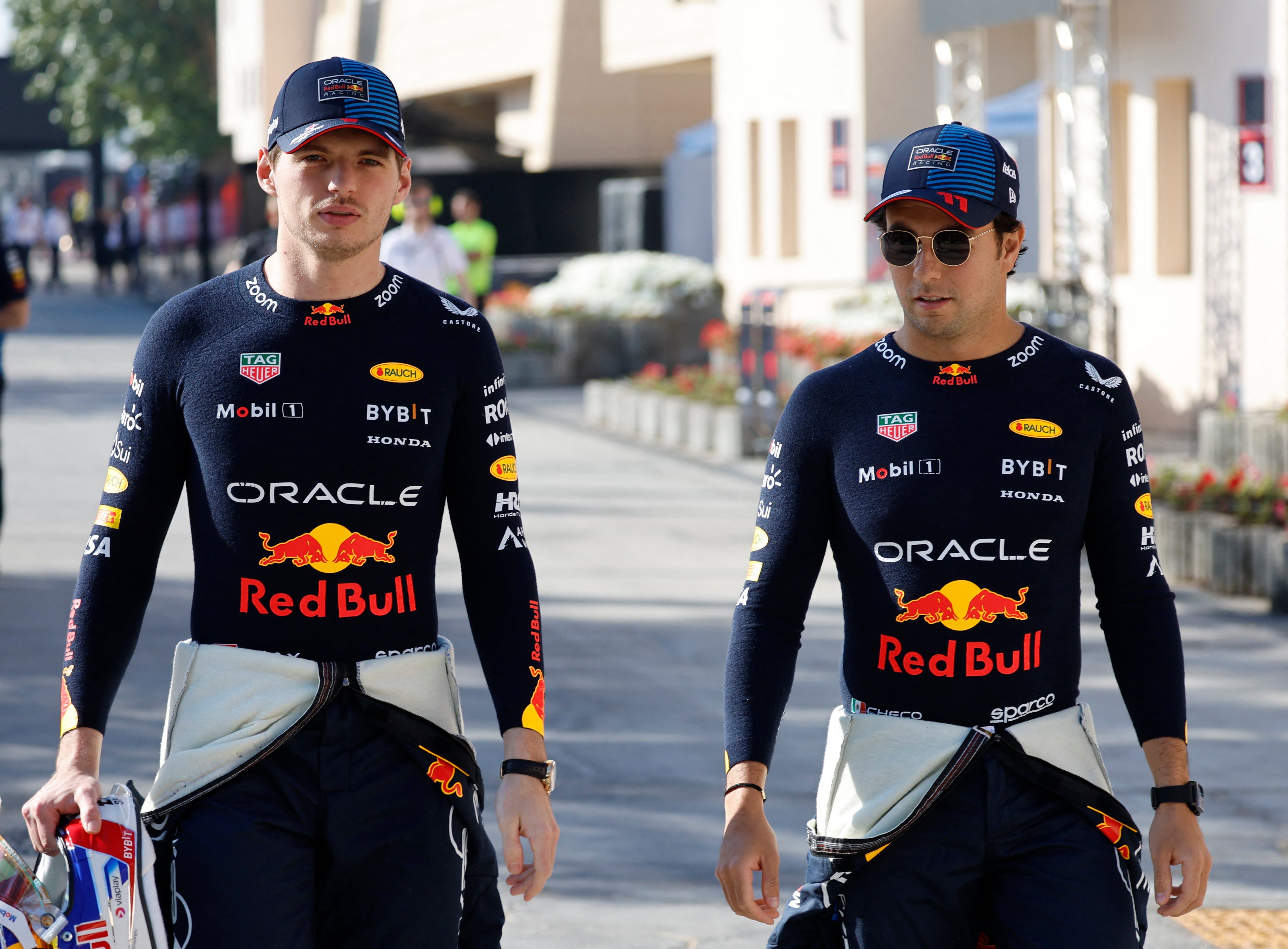 Red Bul are considering the future of Sergio Perez (right)