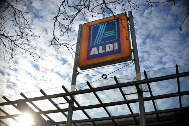 Supermarket giant Aldi is to hire 5,500 more workers this year (Anthony Devlin/PA)