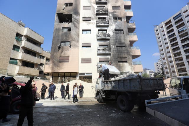 <p> A damaged building following a missile strike in Damascus, Syria</p>