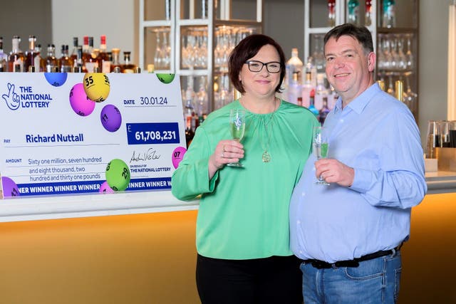 Richard and Debbie Nuttall, both 54, from Colne, Lancashire, won more than £60 million (Anthony Devlin/PA)