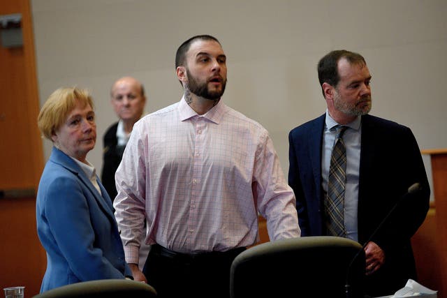<p>Adam Montgomery and his lawyers Caroline Smith and James Brooks watch as potential jurors enter the courtroom for jury selection ahead of his murder trial at Hillsborough County Superior Court in Manchester, New Hampshire, on Tuesday 6 February 2024</p>
