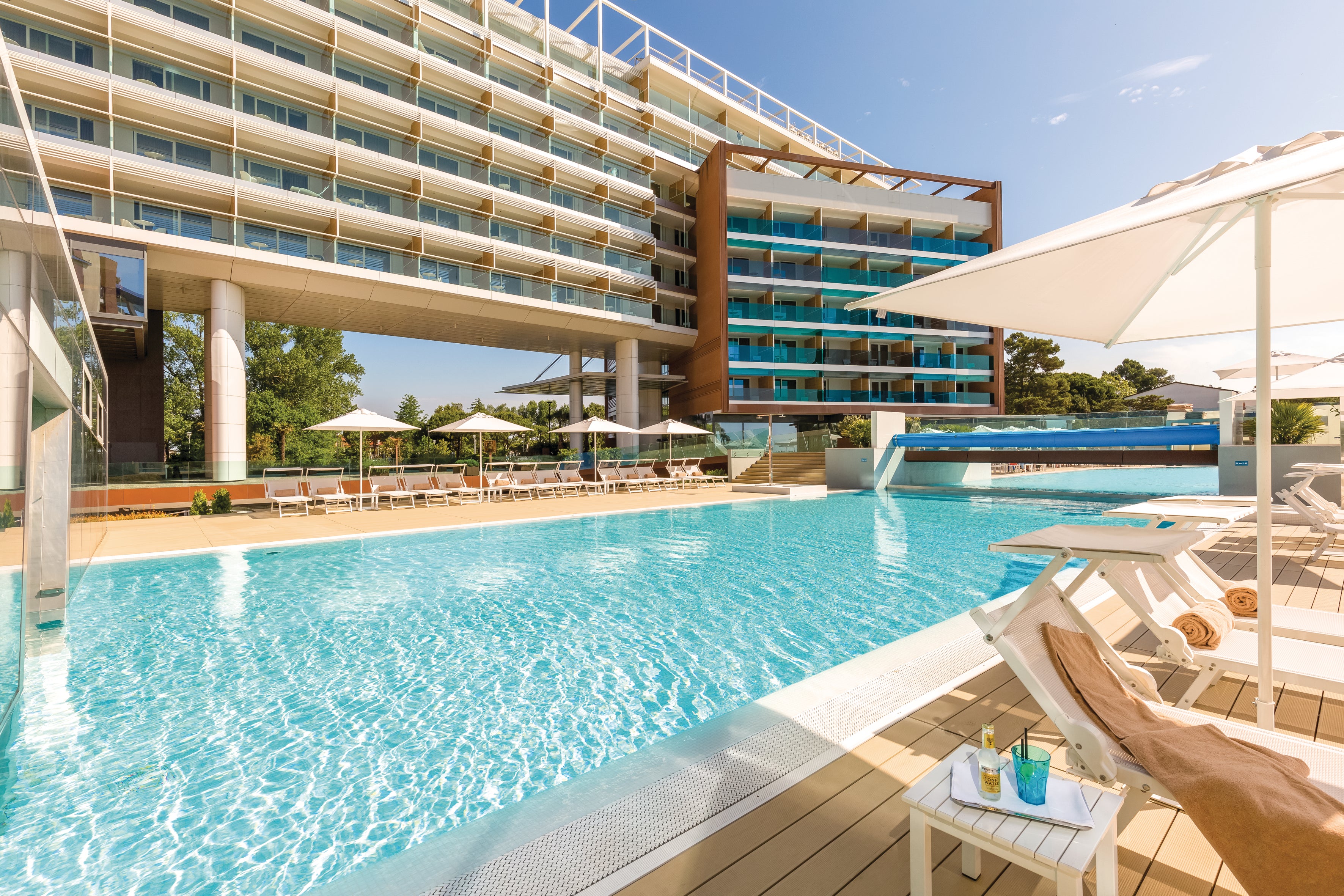 Enjoy days by the pool or on the private beach at Almar Jesolo Resort and Spa