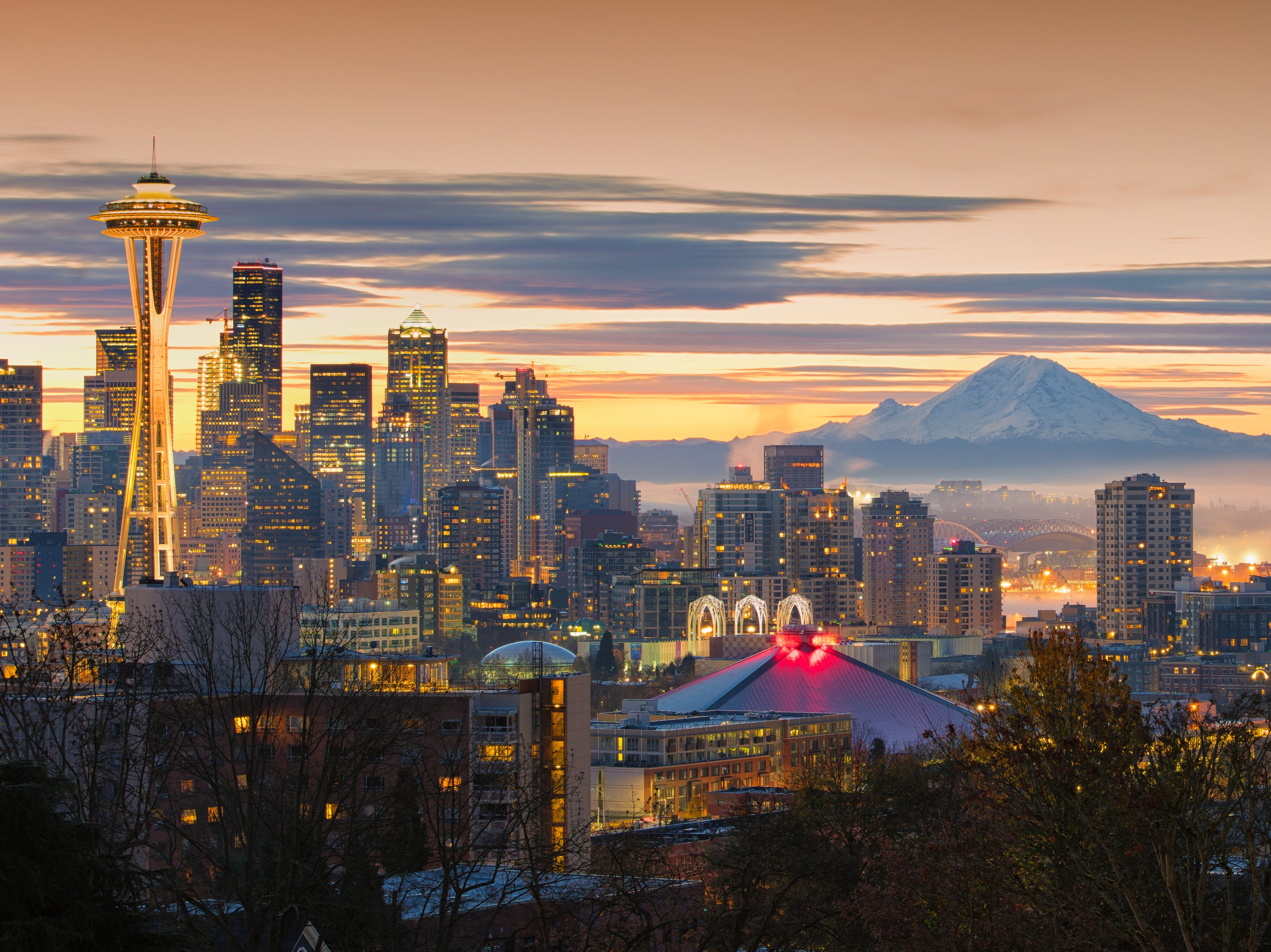 Seattle sparkles under Mount Rainier