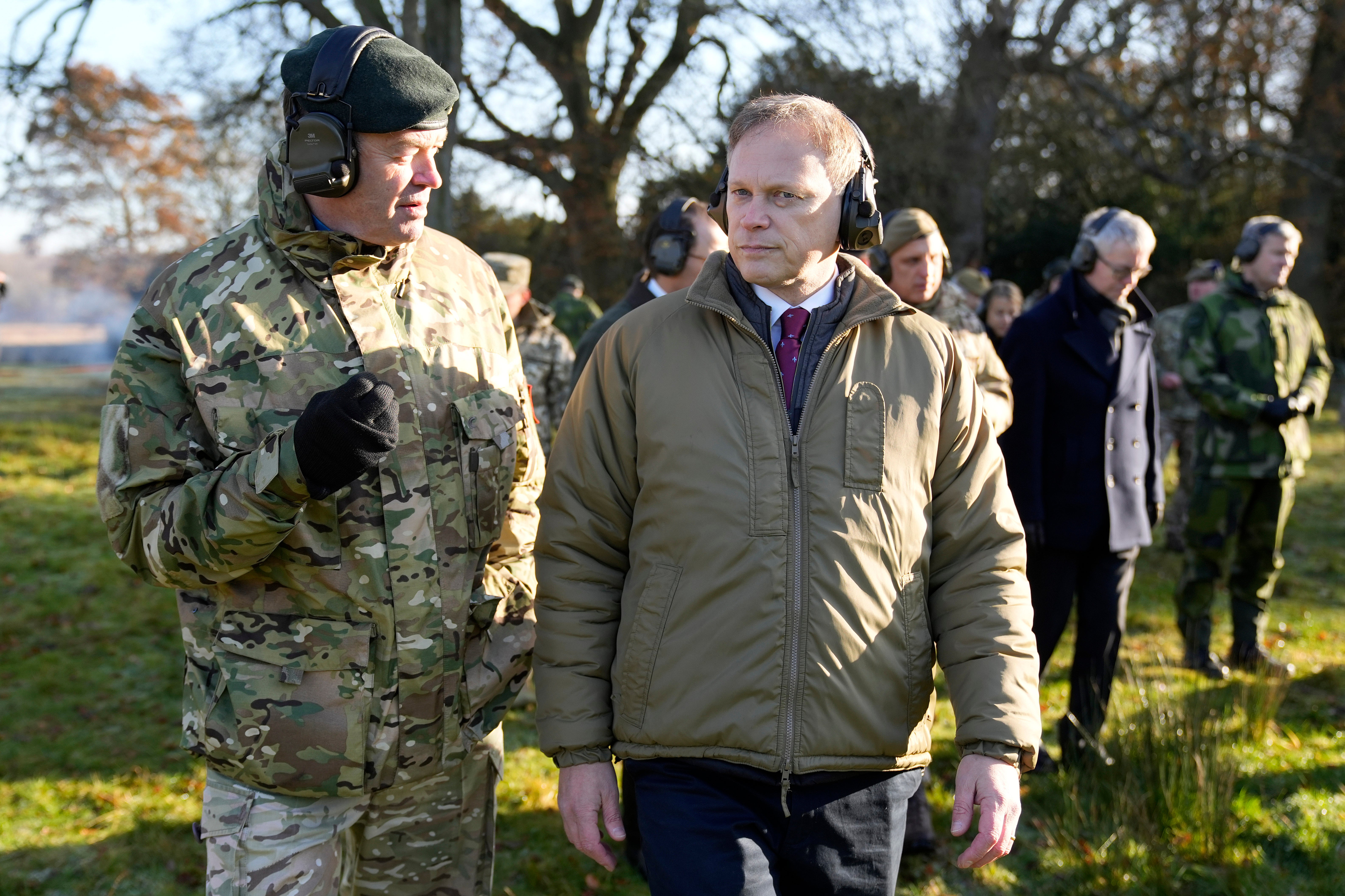 Defence secretary Grant Shapps, right, speaks with Sanders on a visit to a training camp last November