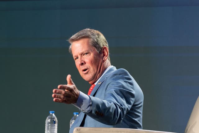 <p>Brian Kemp speaks at an event hosted by Conservative radio host Erick Erickson on 18 August 2023 in Atlanta, Georgia. </p>