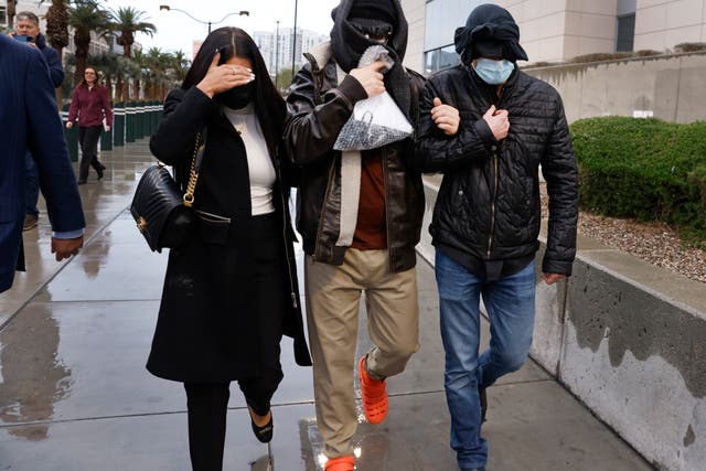 <p>Former FBI informant Alexander Smirnov, center, leaves the courthouse on Tuesday, Feb. 20, 2024, in Las Vegas. Prosecutors say that Smirnov, who is charged with making up a multimillion-dollar bribery scheme involving President Joe Biden, his son Hunter and a Ukrainian energy company, had contacts with Russian intelligence-affiliated officials.</p>