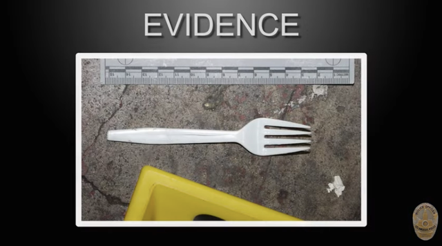 <p>Police evidence photo of the white plastic fork Jason Maccani was holding at the time of the shooting</p>