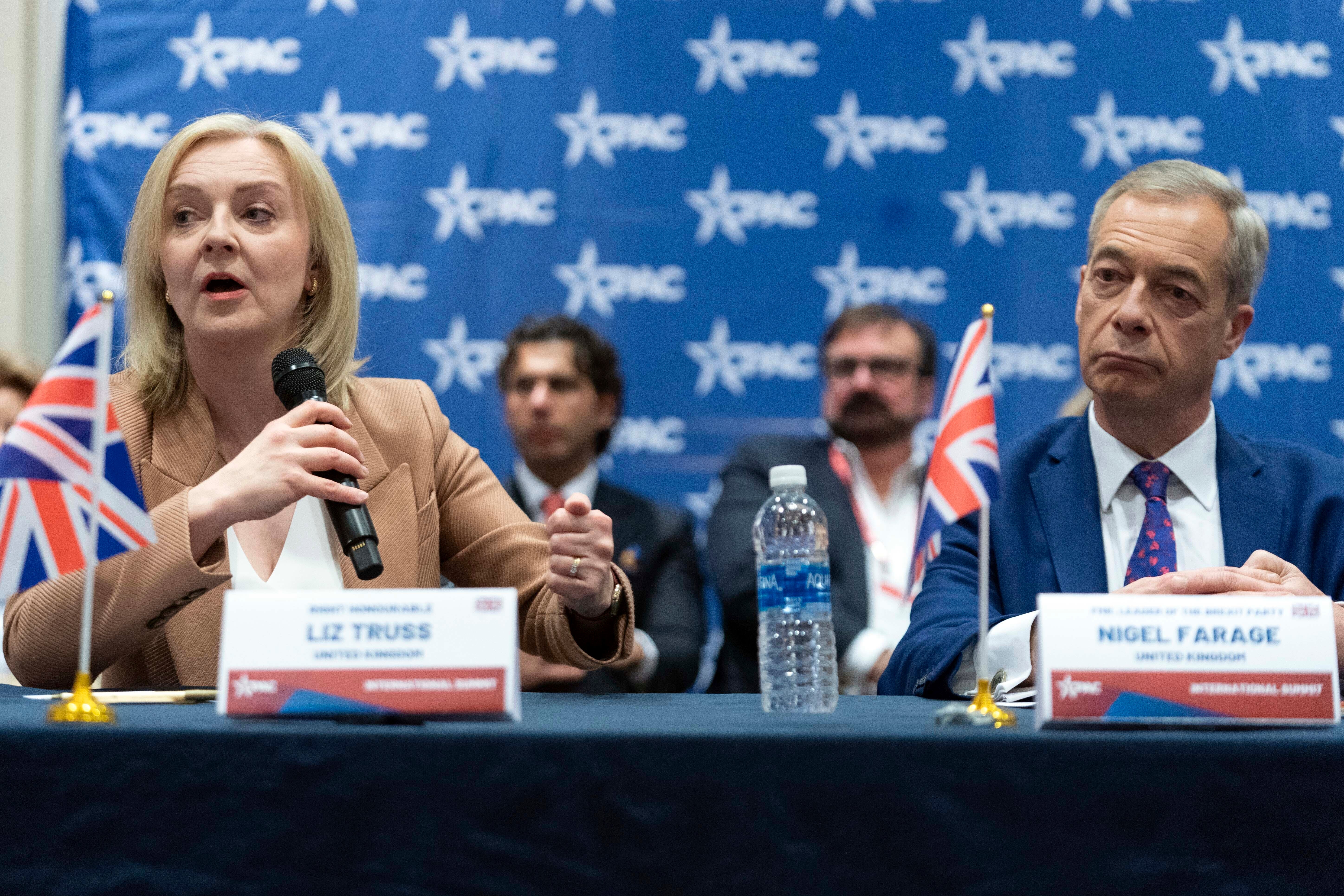 Former UK prime minister Liz Truss and ex-Brexit Party leader Nigel Farage at CPAC in Washington DC