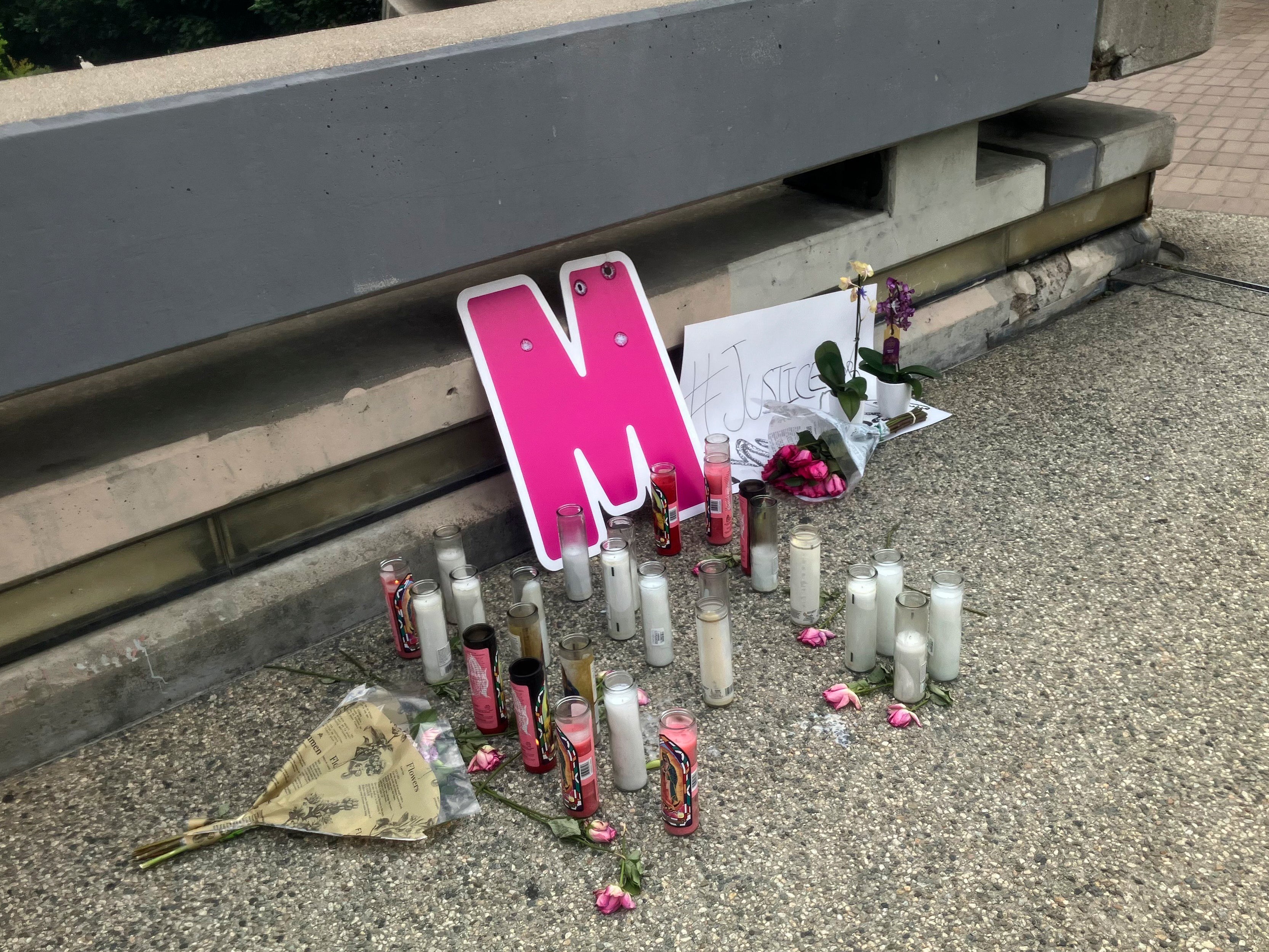 A street-side memorial for Maleesa Mooney, who was killed in her apartment, is displayed on Sept. 20, 2023, in downtown Los Angeles