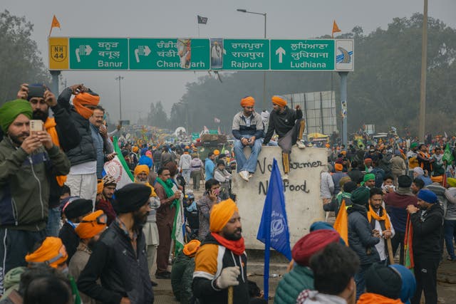 <p>Farmers prepare to break through barricades during a demonstration as they try to move towards Delhi on February 21, 2024 in Shambhu border area, India.</p>