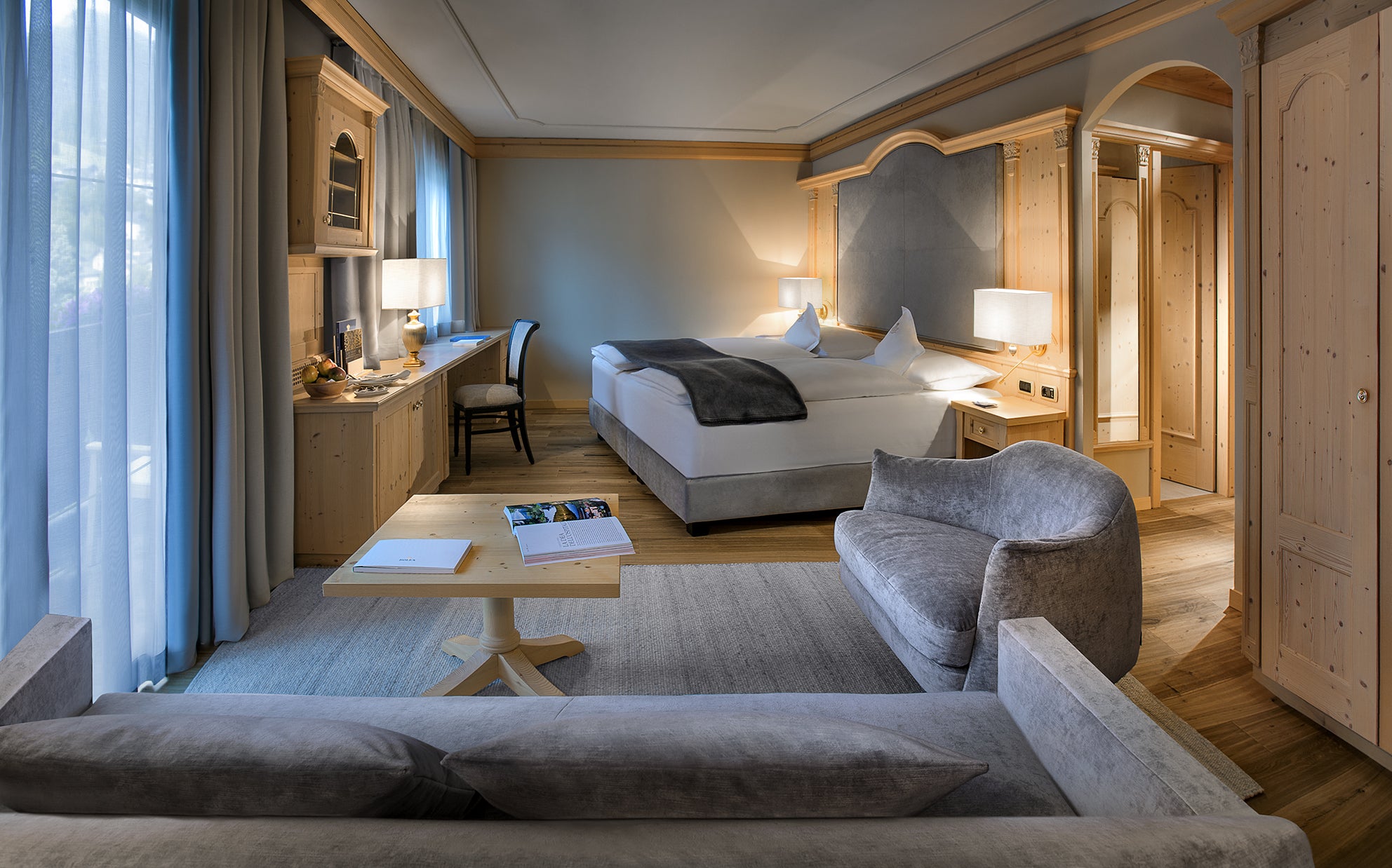 The rooms at Gardena Grodnerhof are spacious with a cosy, alpine feel