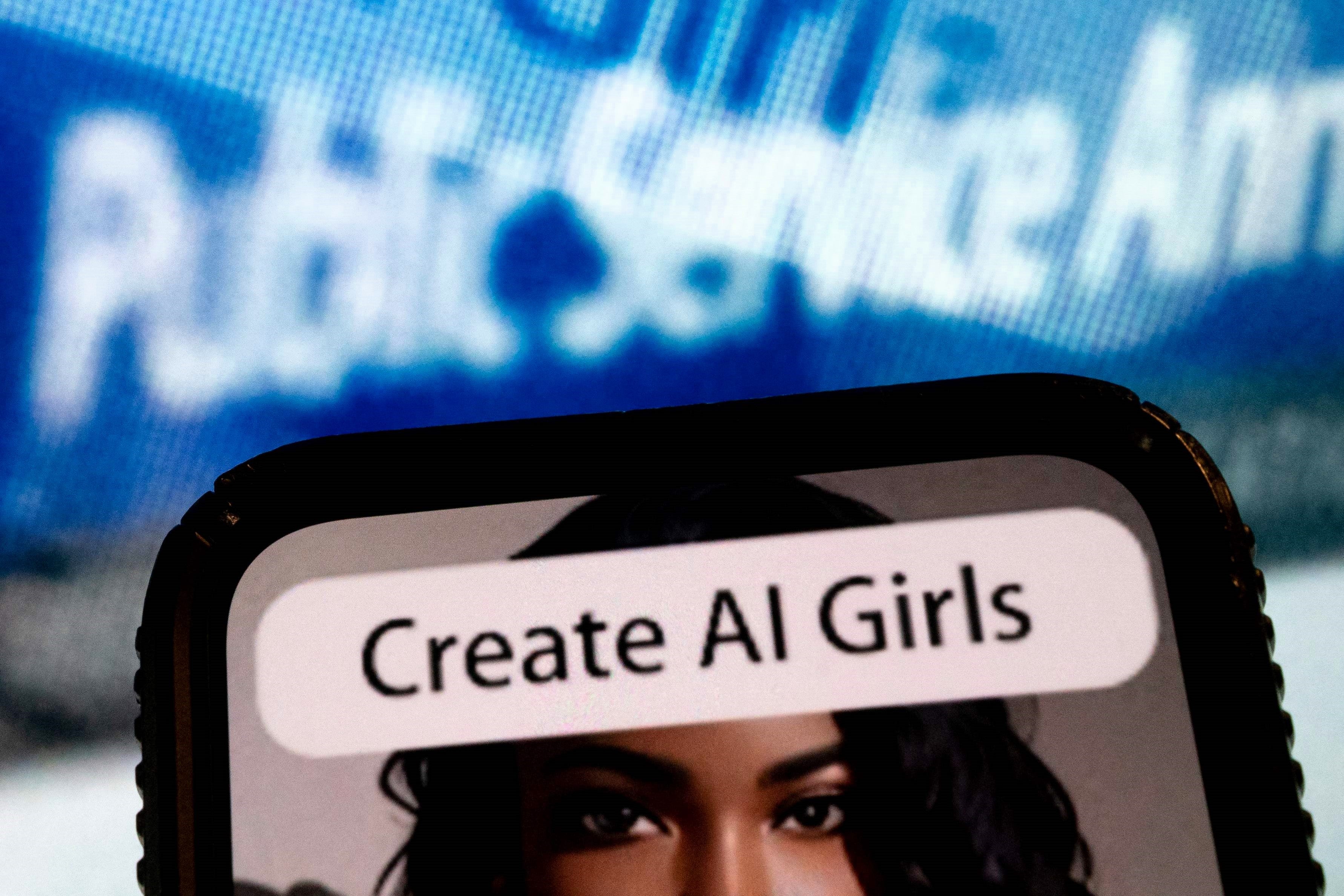 An advertisement to create AI girls shown on a phone screen on 18 July, 2023, in Washington, DC