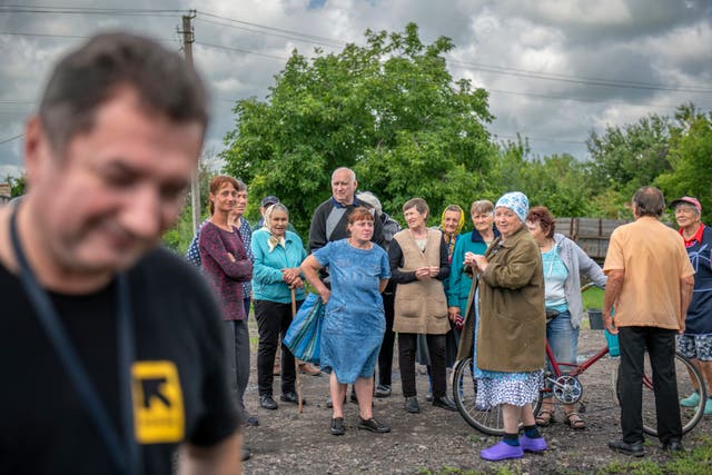 <p>Members of the International Rescue Committee attend residents of Novostepanivka, Kharkiv, whose village had its medical supply chain damaged and nearby fields laid with mines during the escalation </p><p></p>