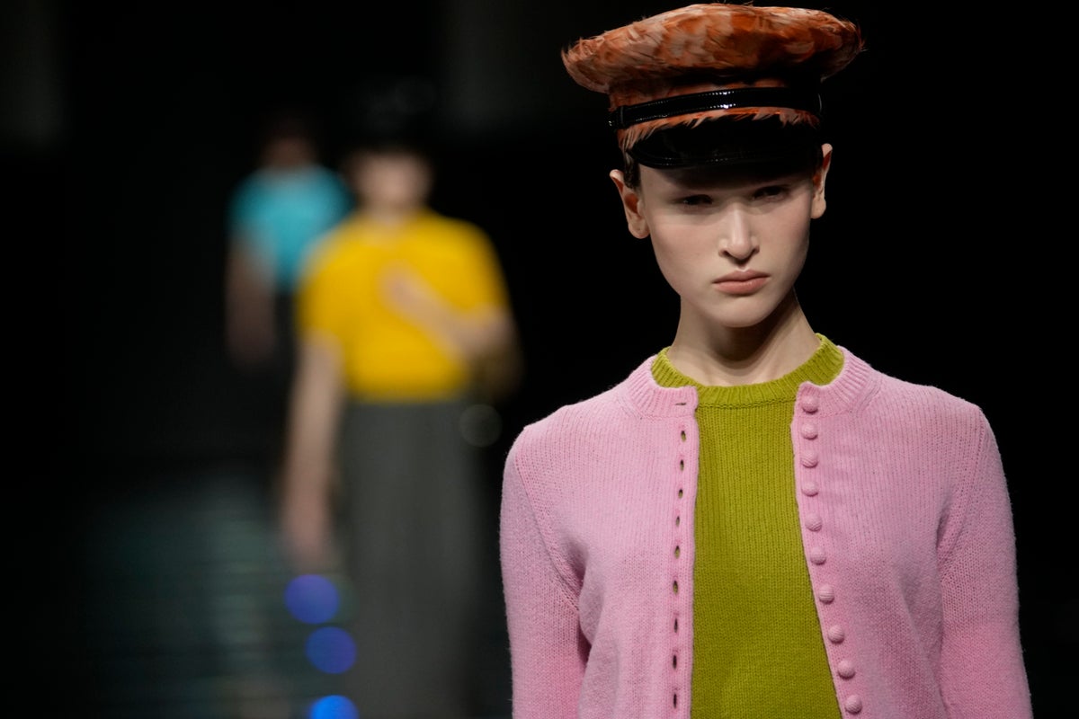 Prada gives new meaning to bows and aprons, historic elements of women's wardrobe, for next season
