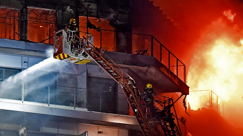 <p>: Spanish firefighters battle deadly blaze in Valencia Campanar buildings.</p>