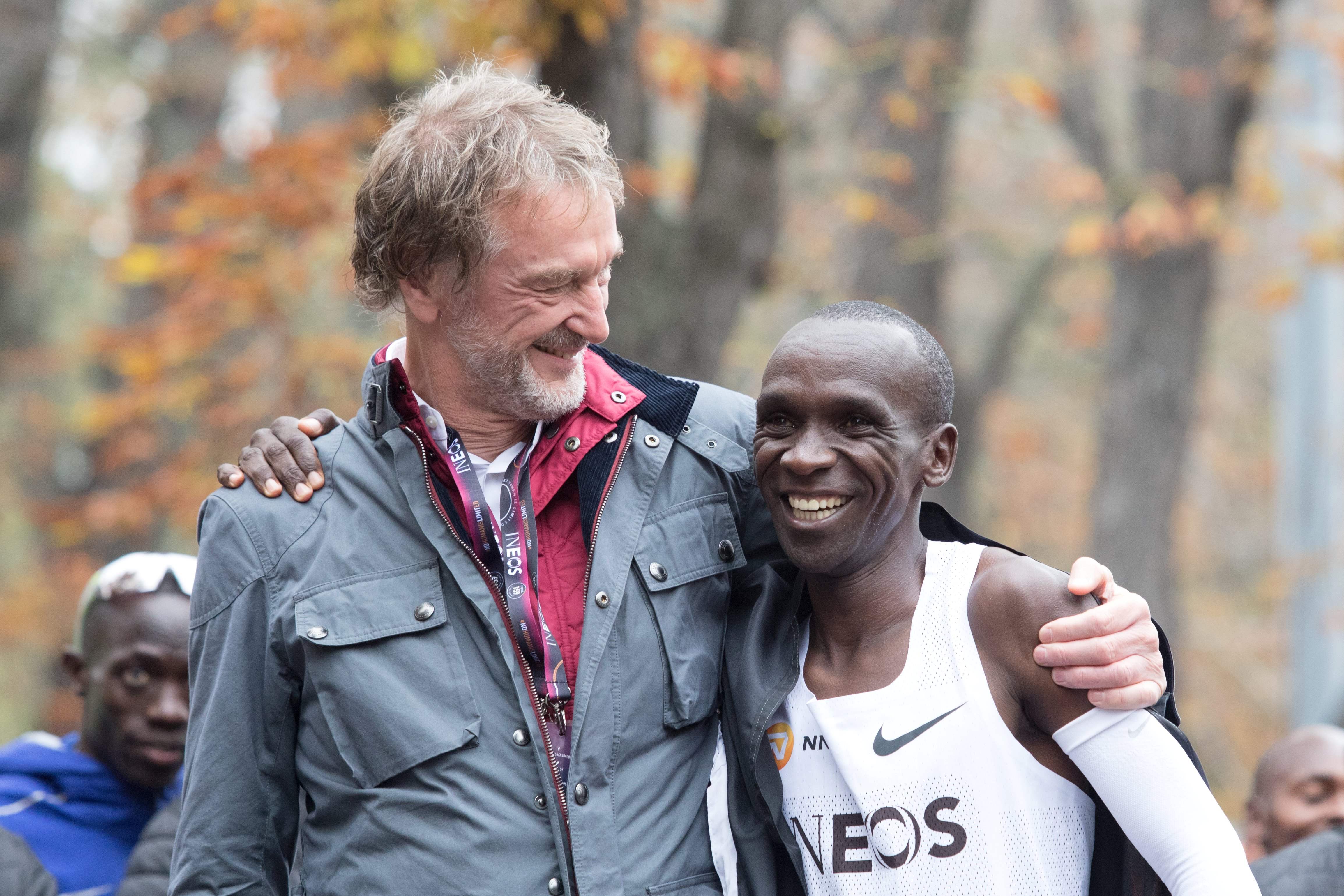 Sir Jim Ratcliffe embraces marathon runner Eliud Kipchoge