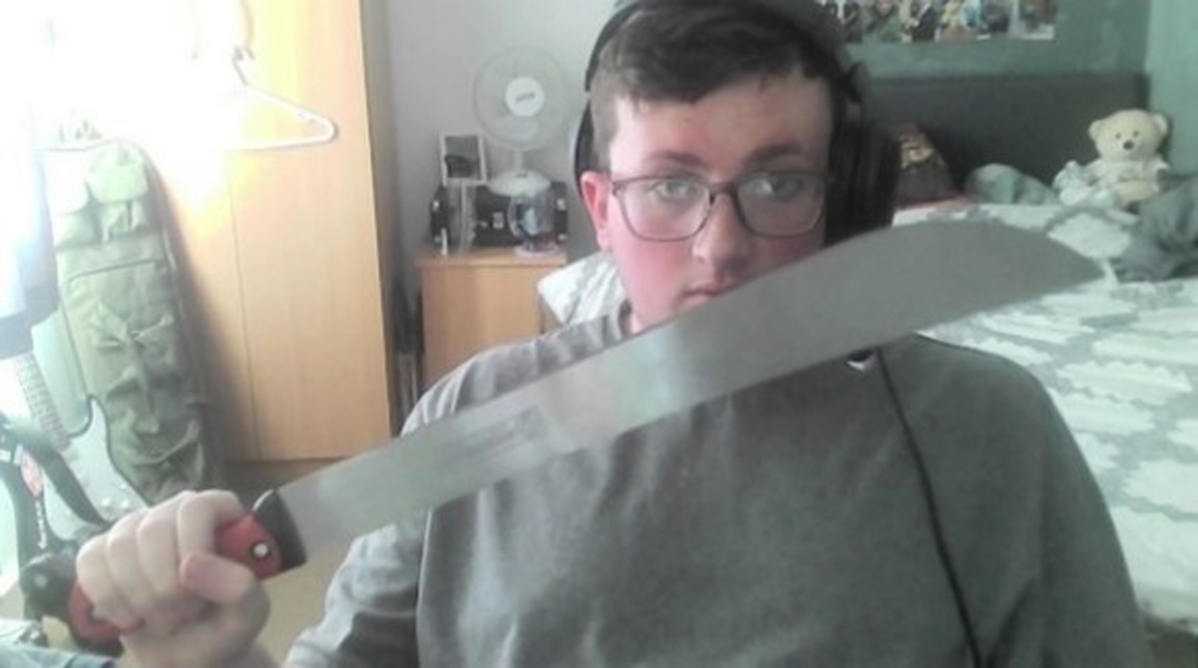 Undated handout photo issued by Greater Manchester Police of Jacob Graham with a machete