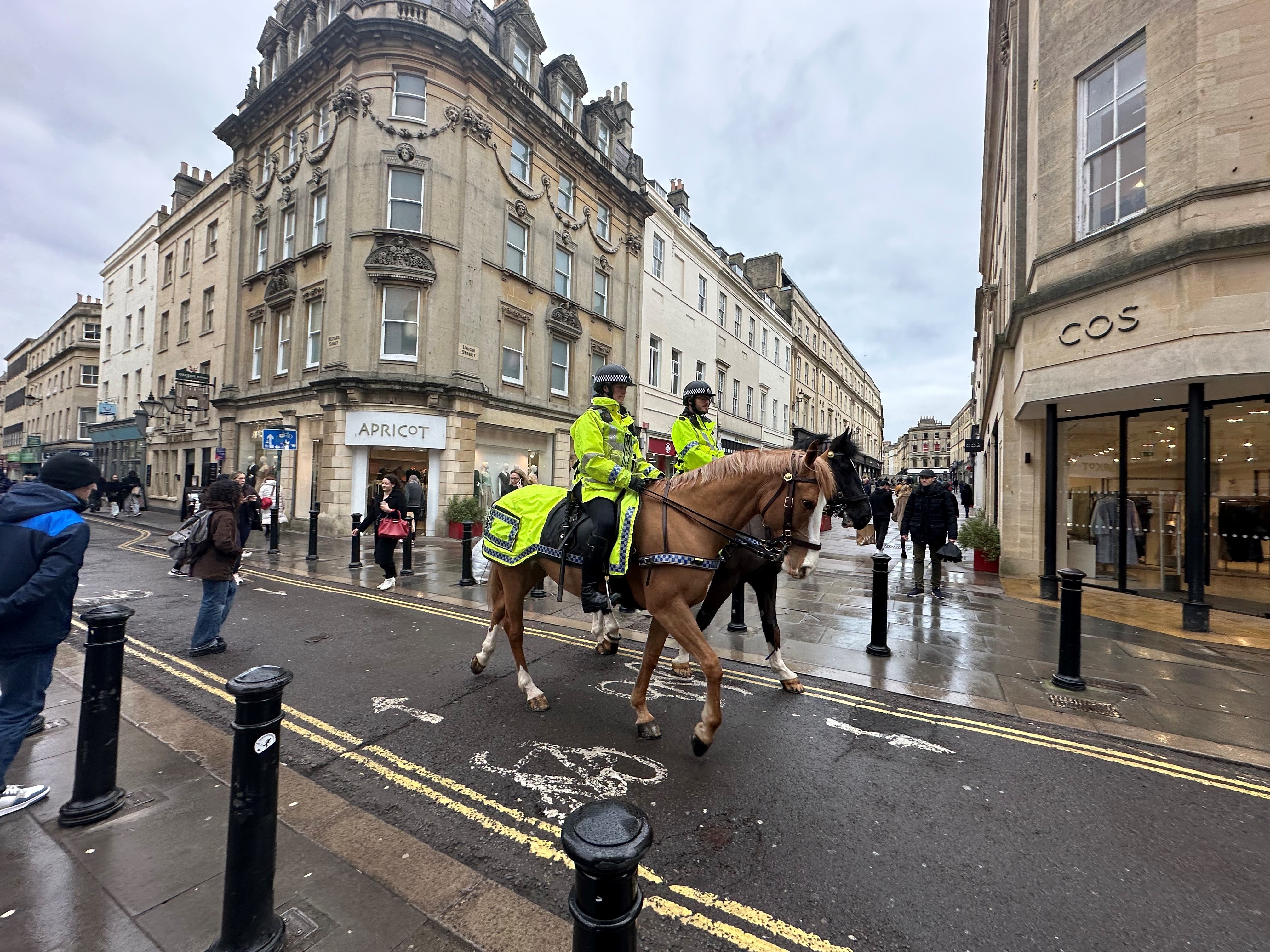 Two mounted police officers patrol Bath city centre as part of an initiative since a stabbing in a city centre park in January