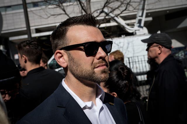<p>The controversial political activist Jack Posobiec pictured in 2023 outside the Trump arraignment </p>