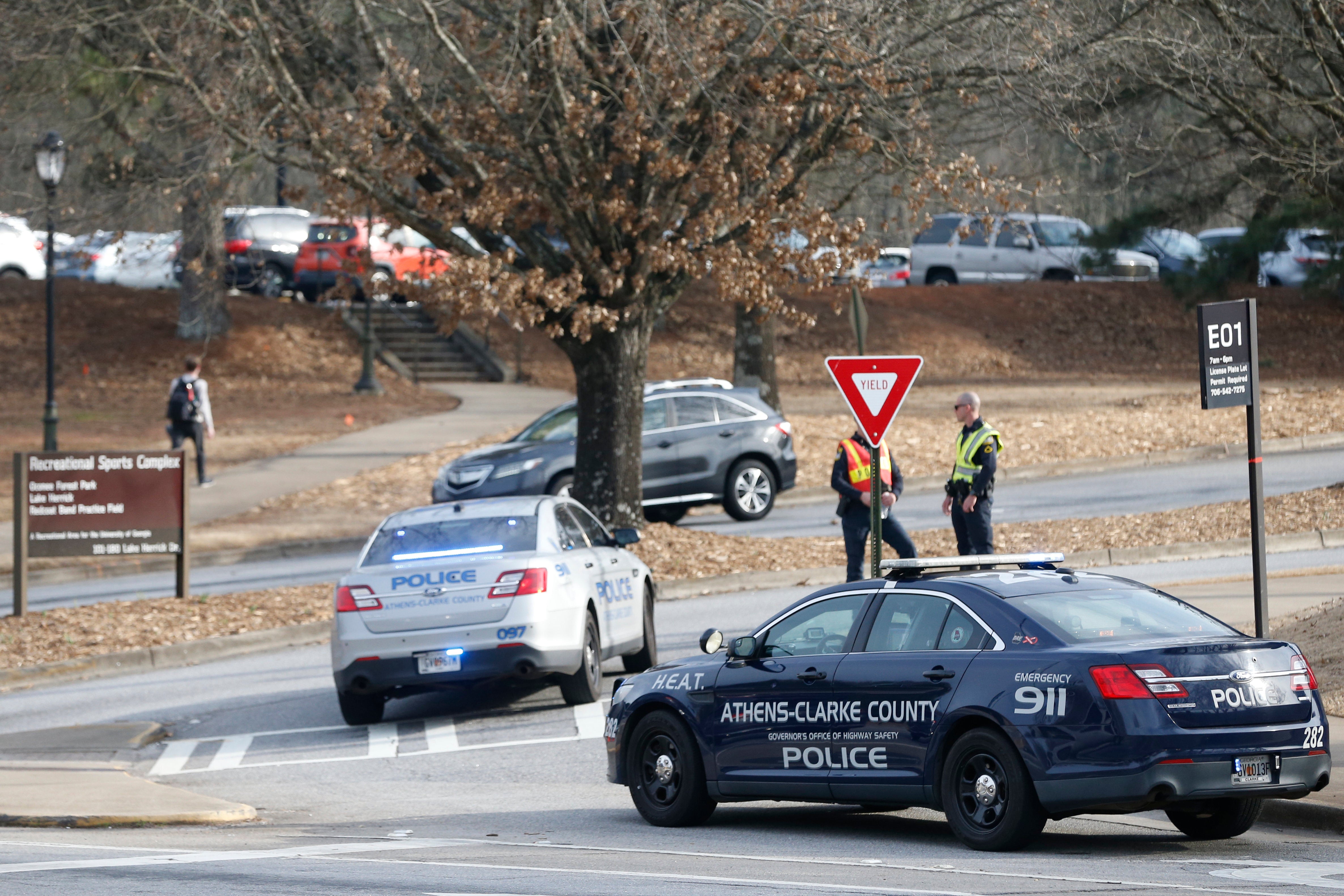 Athens-Clarke County police block traffic and investigate at the UGA intramural Fields after Laken Riley’s body was found on Thursday