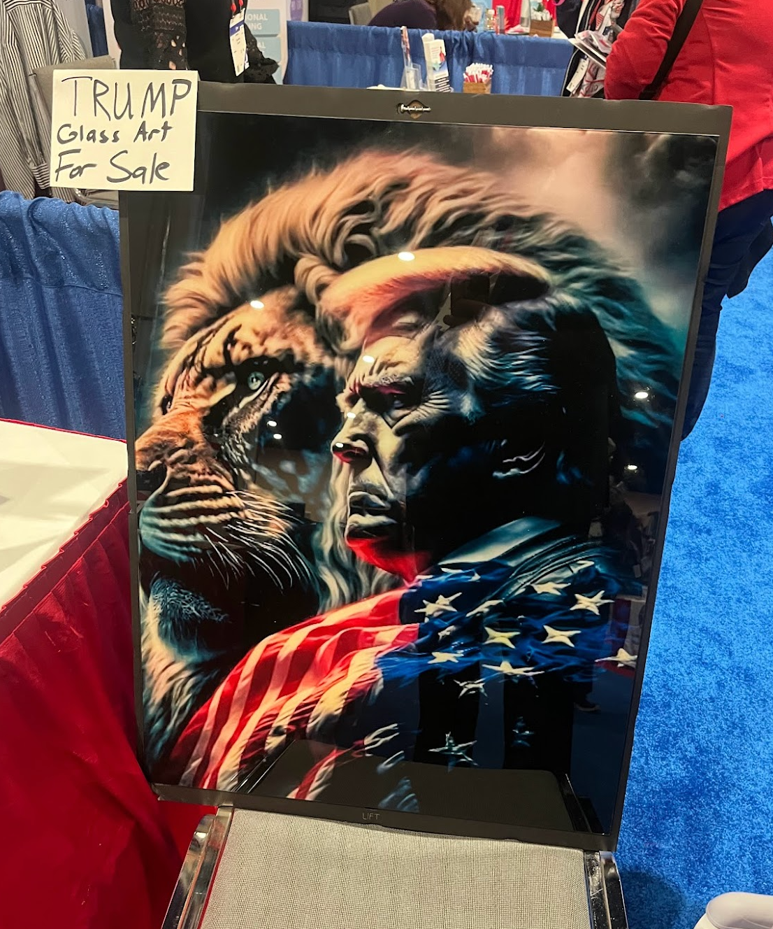 Donald Trump looks ahead next to a lion in a painting being sold at CPAC