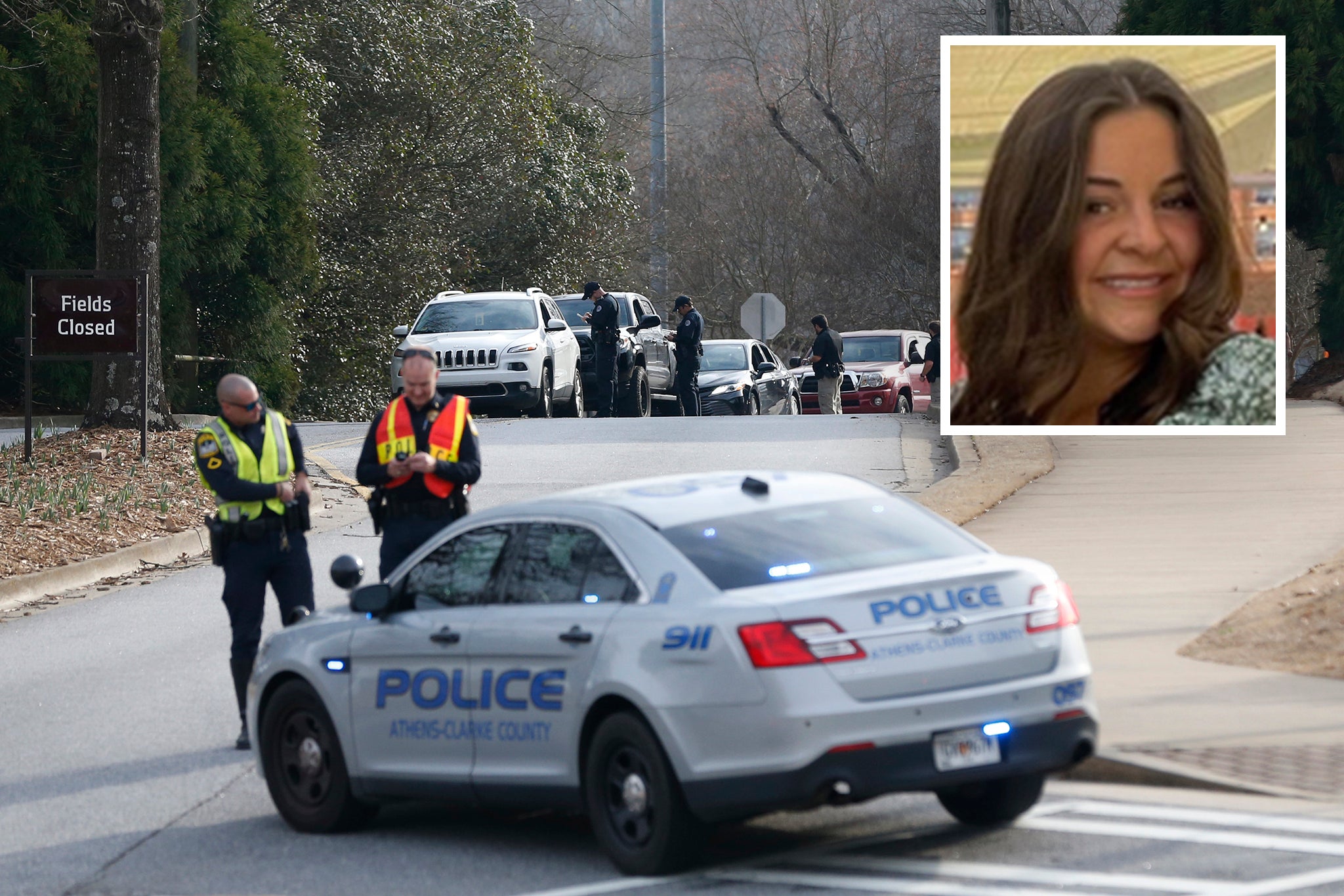 <p>Athens-Clarke County police block traffic and investigate at the UGA intramural Fields after the body of a women was found with found with visible injuries was found in the woods around Lake Herrick in Athens, Georgia </p>