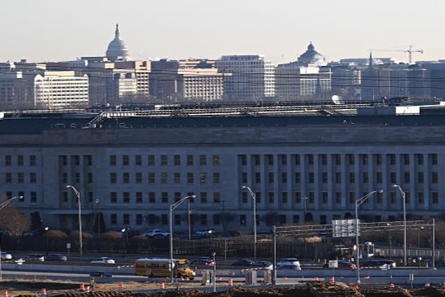 <p>The Pentagon (front) with the US Capitol (L, background) in Washington, DC, on January 11, 2024. </p>