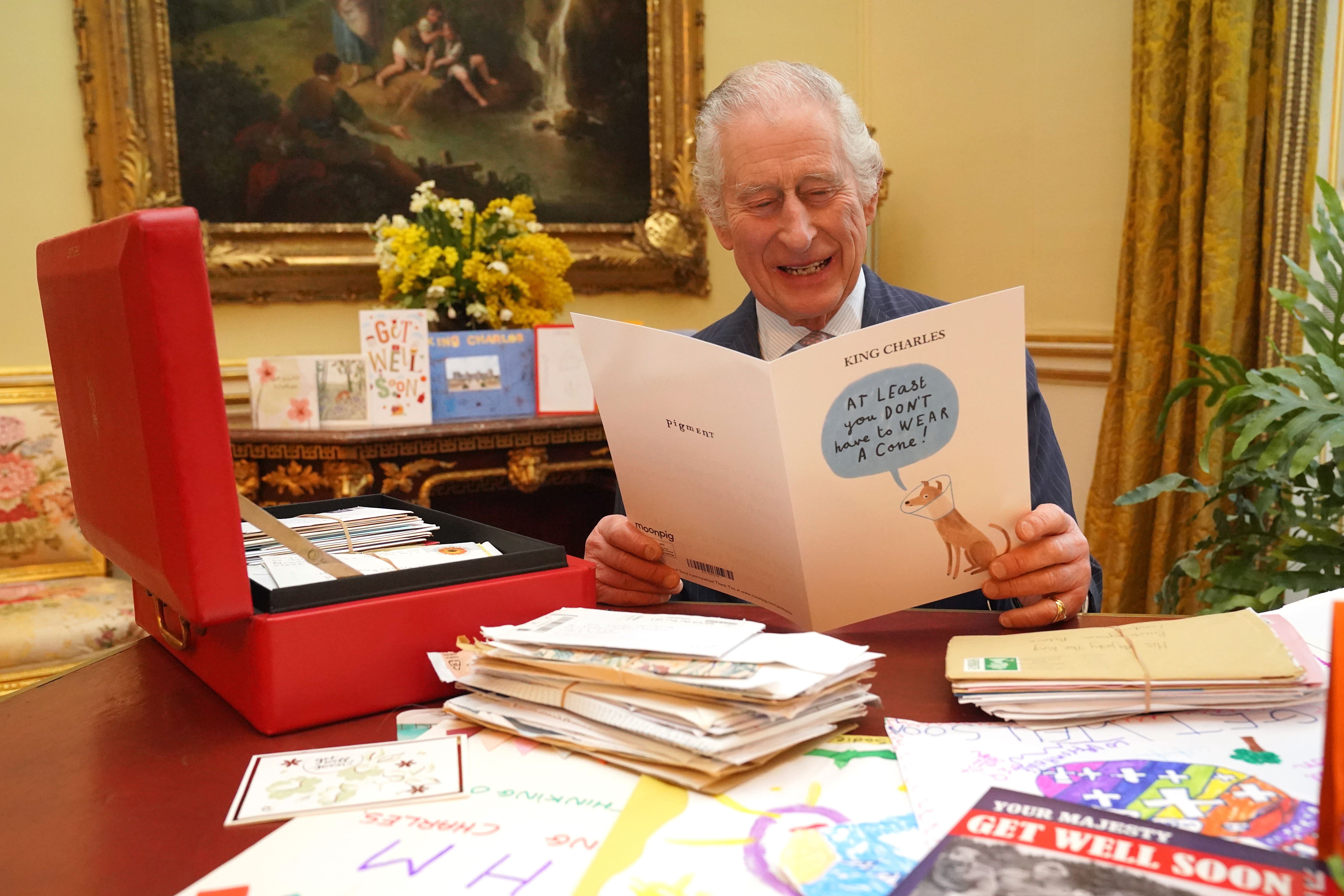 The King reads messages of support from well-wishers following his cancer diagnosis (Jonathan Brady/PA)