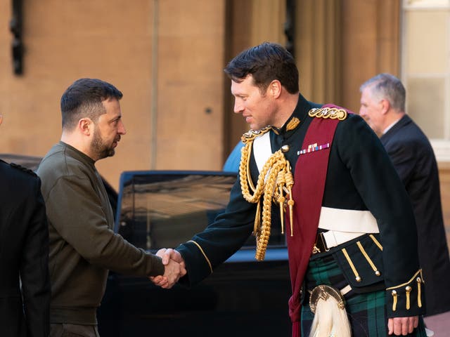 <p>Ukrainian President Volodymyr Zelensky is greeted by Lieutenant Colonel Johnny Thompson, equerry to King Charles III, as he arrives for an audience with the King at Buckingham Palace on 8 February 2023 in London, England</p>