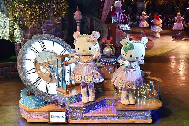 <p>File: Hello Kitty and her twin sister Mimmy (R) celebrate in the Hello Kitty 40th anniversary parade at Tokyo’s Sanrio Puroland on 1 November 2014</p>