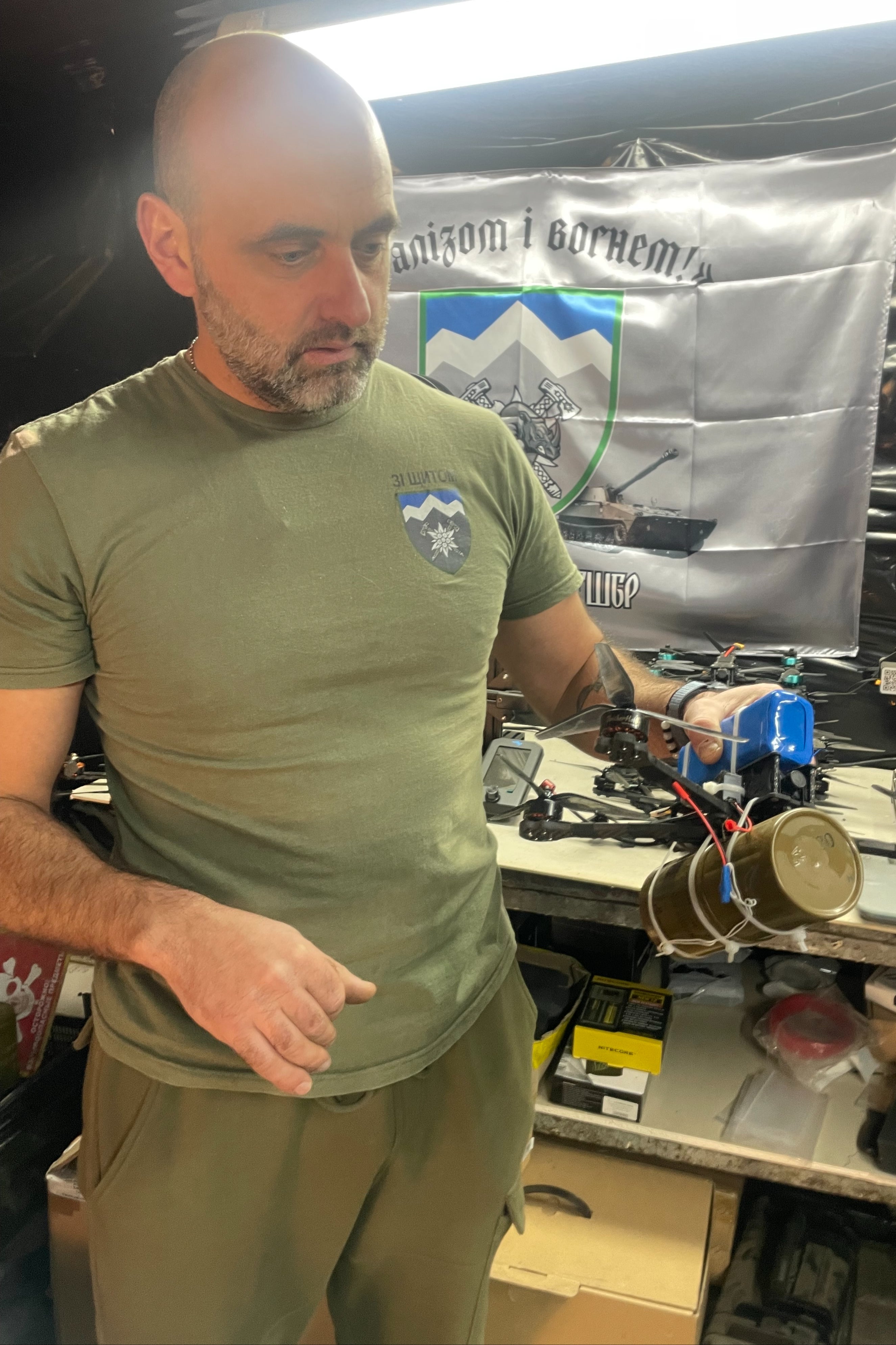 ‘Curly’ attaching a bomb to a drone