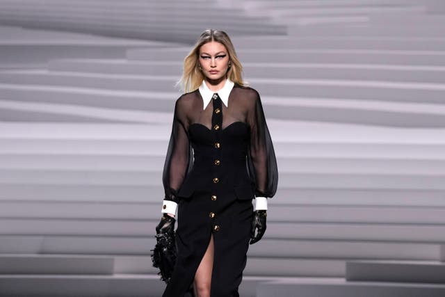 Gigi Hadid walked the runway for Versace’s latest Milan Fashion Week show (Antonio Calanni/AP)