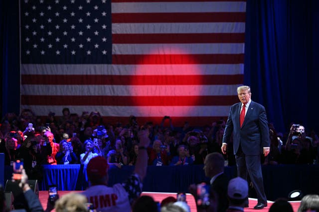 <p>Former US President and 2024 presidential hopeful Donald Trump arrives to speak during the annual Conservative Political Action Conference (CPAC) meeting on February 24, 2024, in National Harbor, Maryland</p>