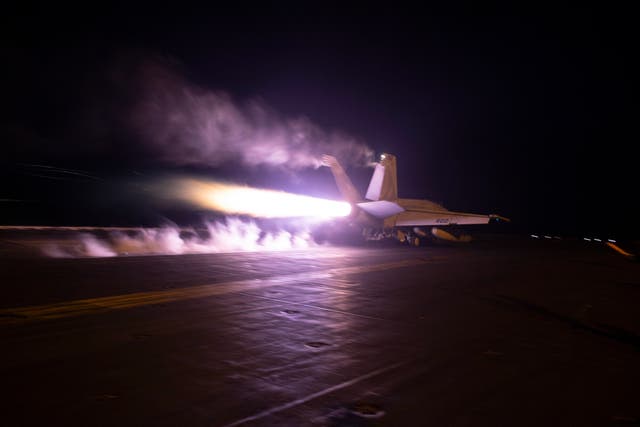 <p>FILE: An American aircraft launching from USS Dwight D Eisenhower </p>