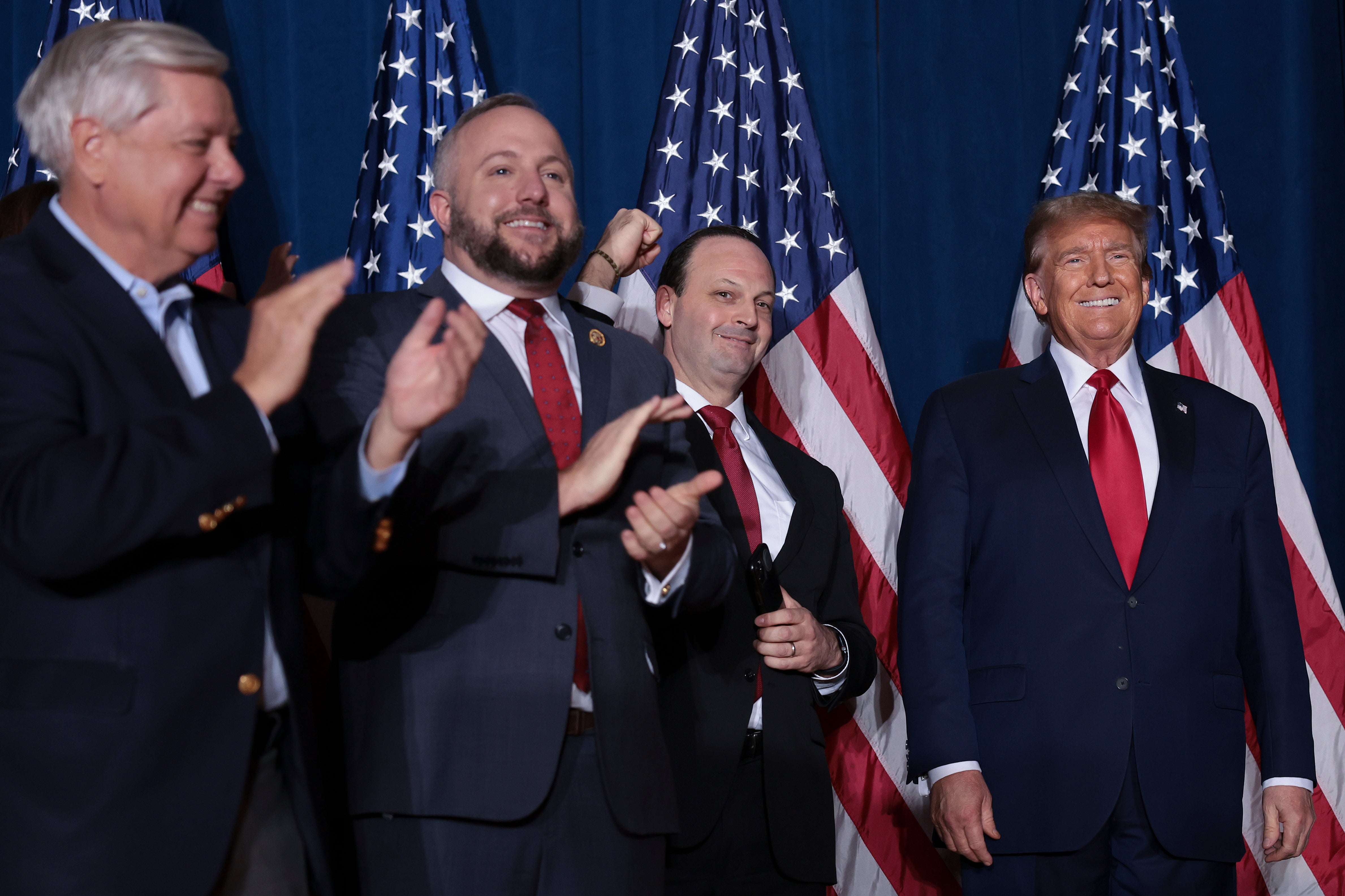 <p>Republican presidential candidate and former president Donald Trump arrives on stage to speak to supporters during an election night watch party at the State Fairgrounds on 24 February 2024 in Columbia, South Carolina</p>