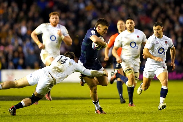 Cam Redpath is tackled in the lead-up to Scotland’s third try (Andrew Milligan/PA)