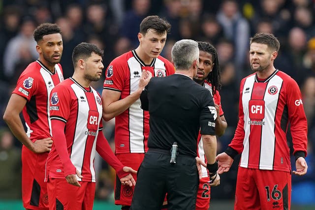 Match referee Darren Bond spoke with the Sheffield United players at Wolves (Mike Egerton/PA)