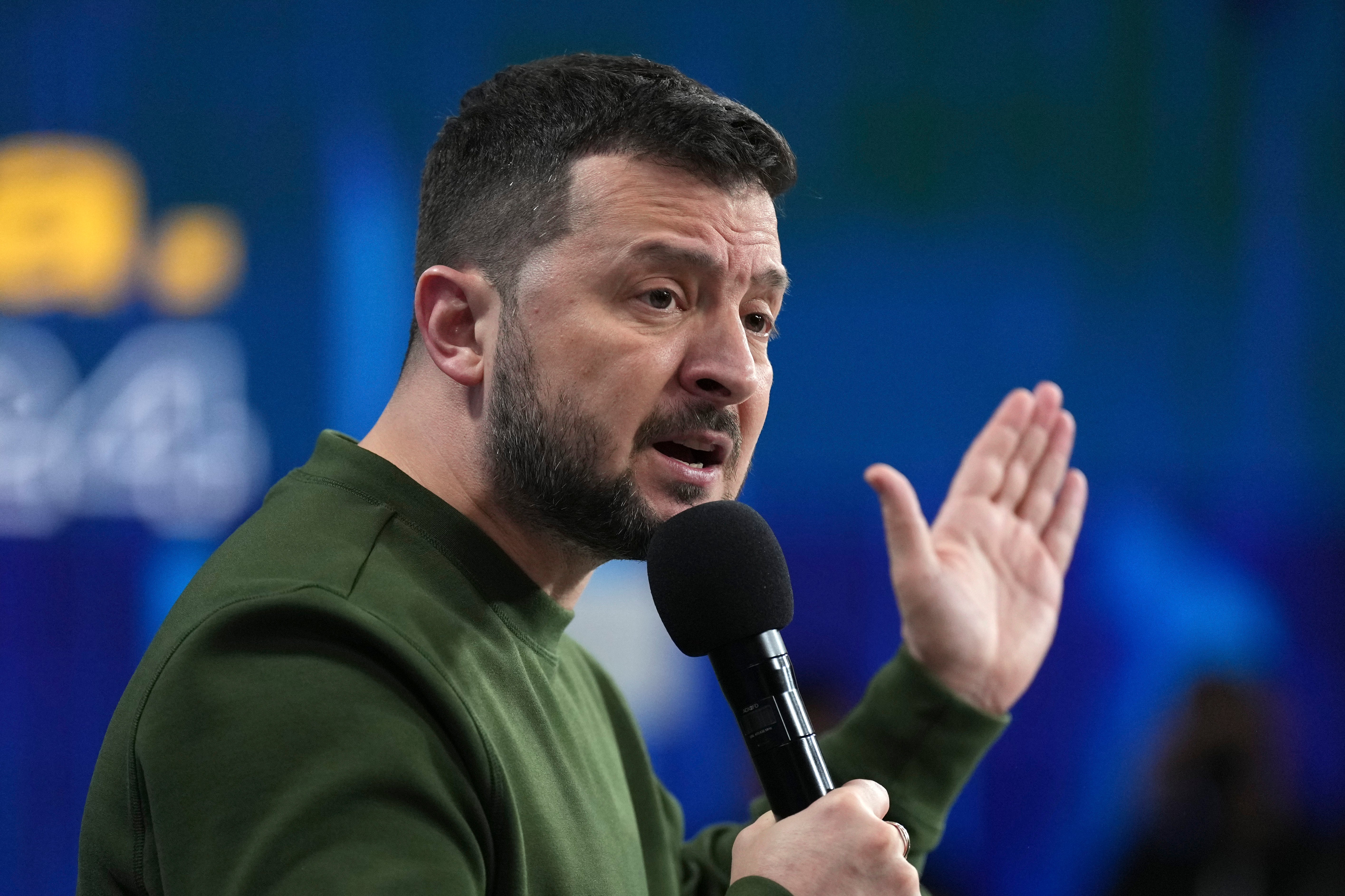 Ukrainian President Volodymyr Zelensky answers media questions during his press conference in Kyiv, Ukraine, on Sunday