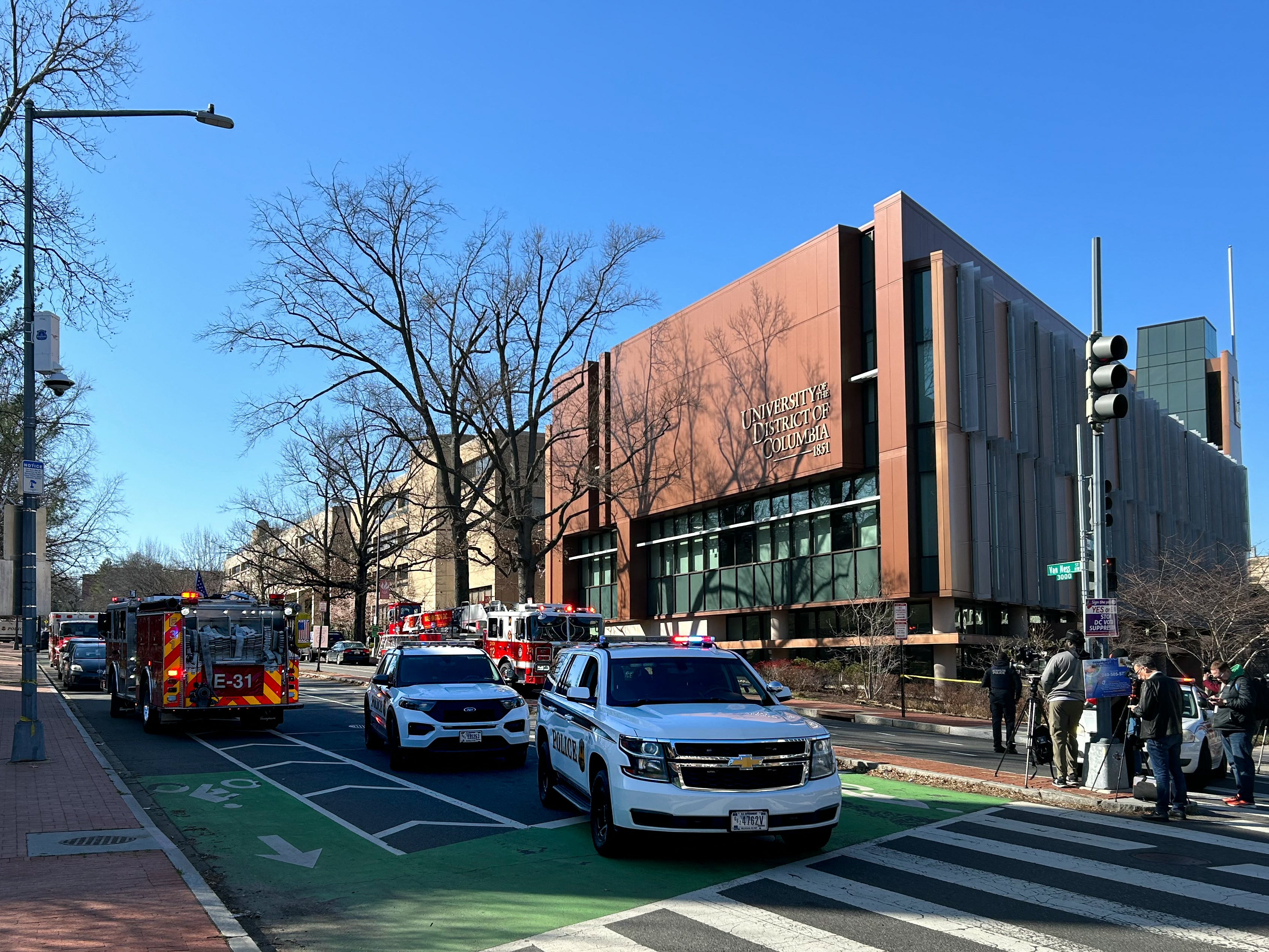 US Secret Service vehicles block access to a street leading to the Embassy of Israel in Washington, DC on February 25, 2024. A man reportedly set himself on fire near the embassy on Sunday afternoon