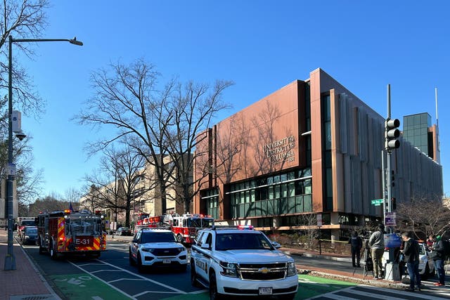 <p>US Secret Service vehicles block access to a street leading to the Embassy of Israel in Washington, DC aftera man reportedly set  himself on fire</p>