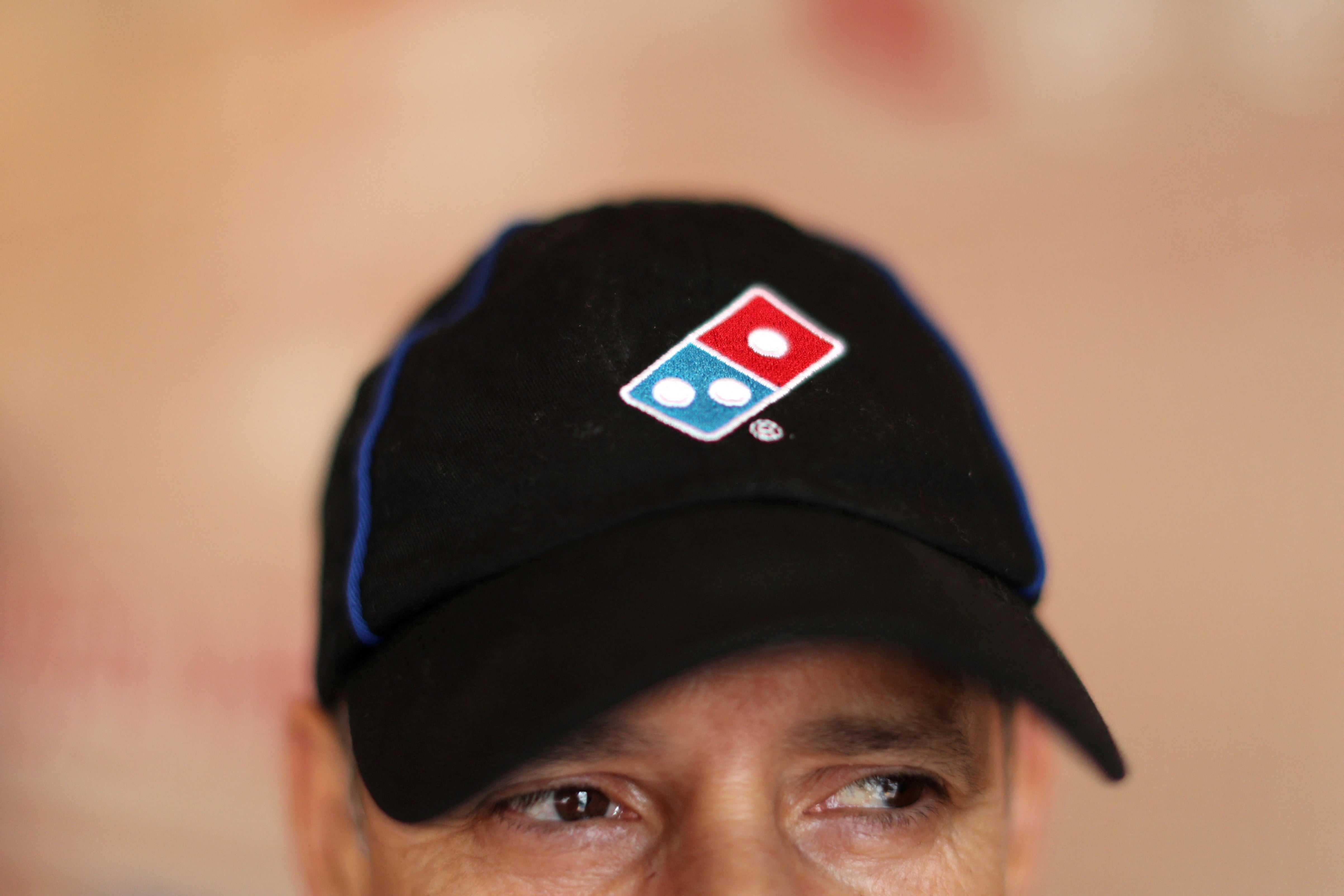 A Domino’s Pizza employee worker