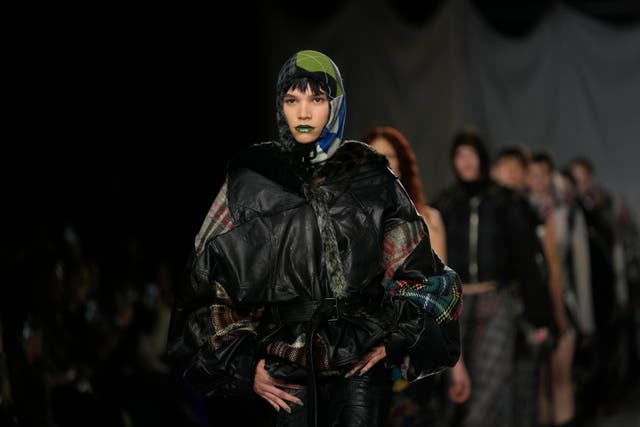 Models wear creations by the Rave Review women’s Fall-Winter 2024-25 collection presented in Milan (AP Photo/Luca Bruno)