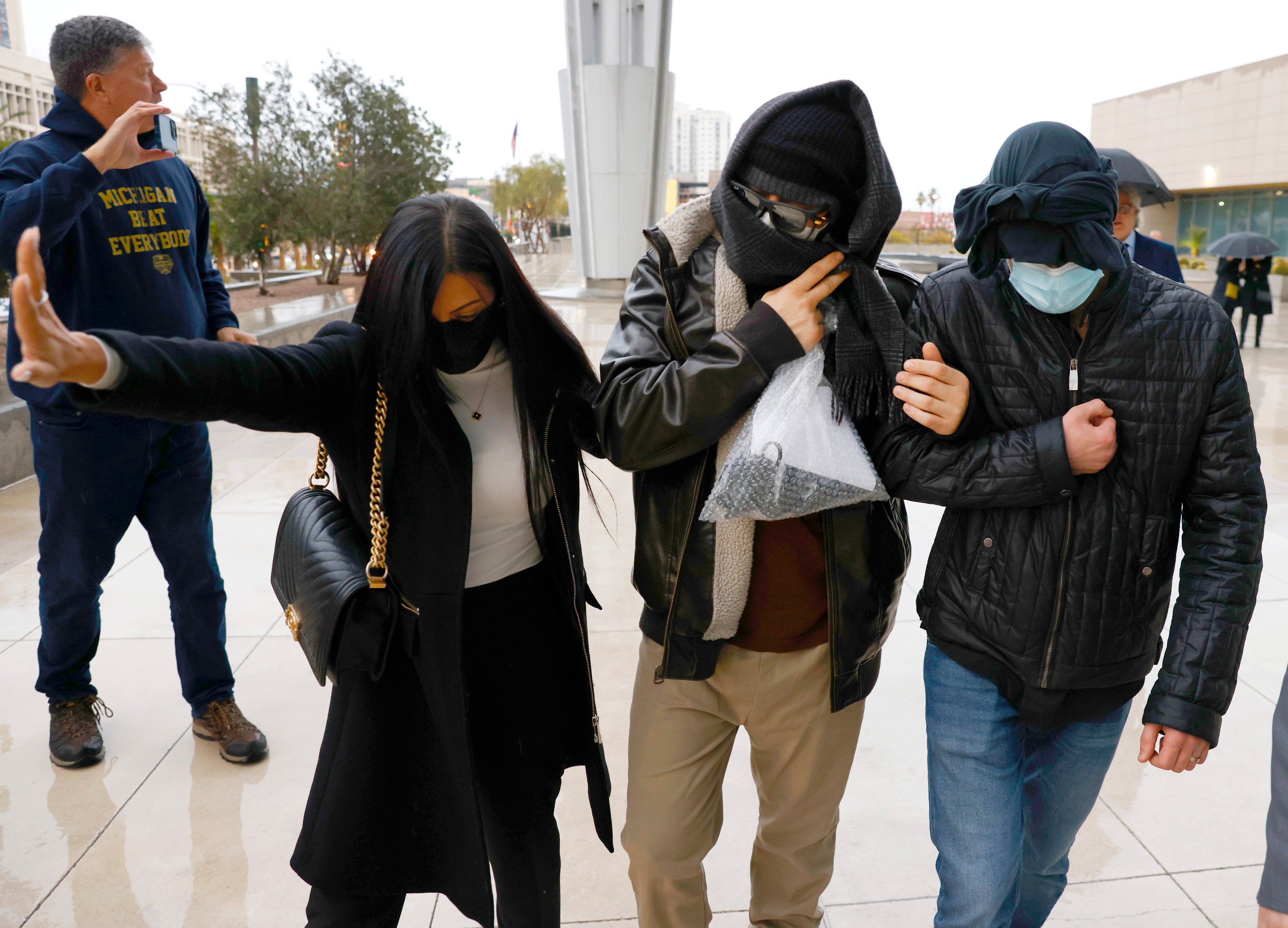 Alexander Smirnov, second from right, leaves the courthouse on 20 February 2024, in Las Vegas