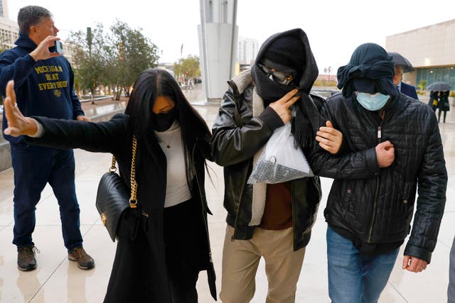 <p>Alexander Smirnov, second from right, leaves the courthouse on 20 February 2024, in Las Vegas</p>