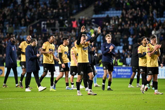 <p>Maidstone’s players thank the away end after defeat at Coventry  </p>