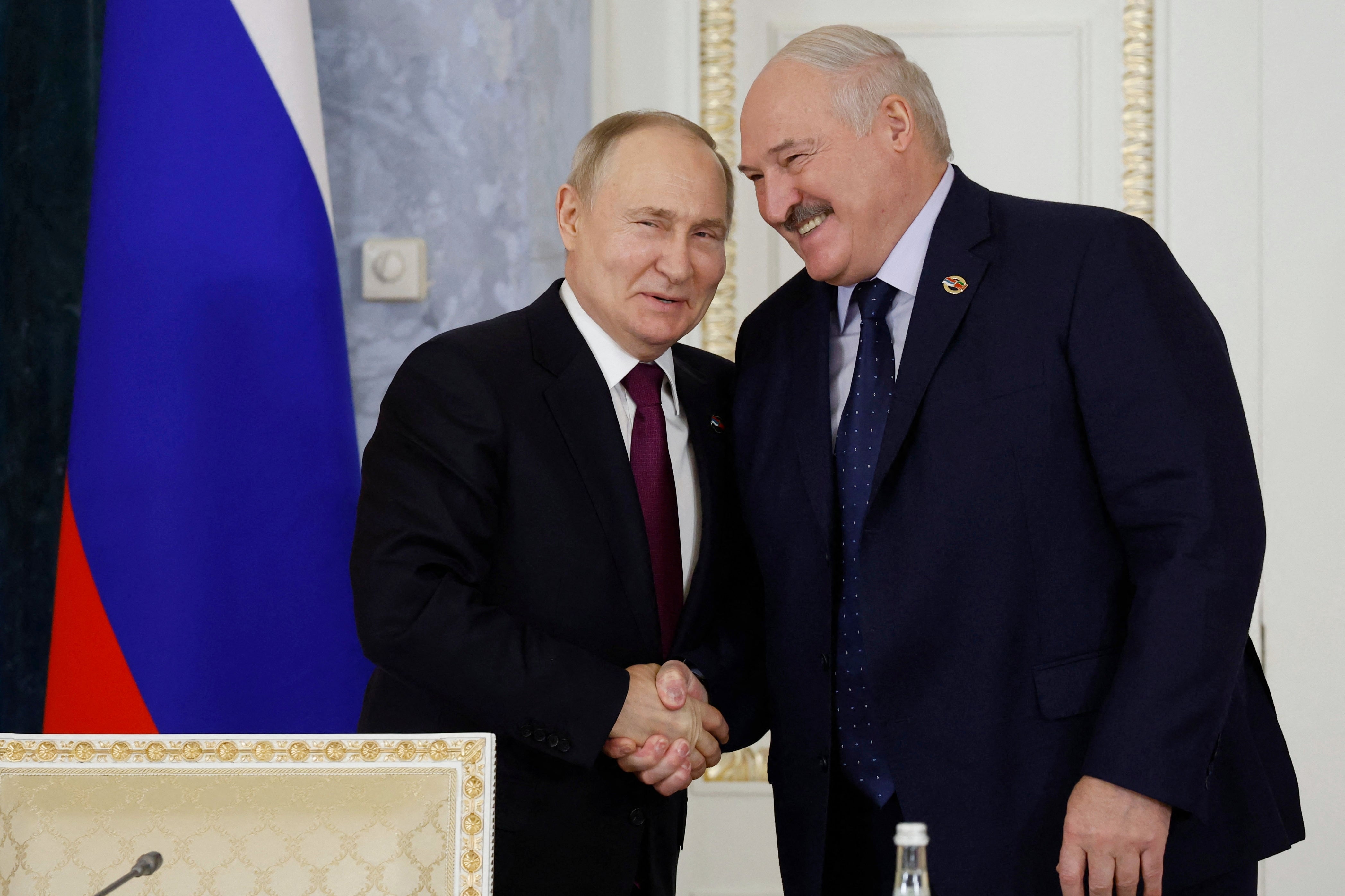 Russia's President Vladimir Putin and Belarus' President Alexander Lukashenko attend a meeting of the Supreme State Council of the Union State of Russia and Belarus, in Saint Petersburg on January 29, 2024.