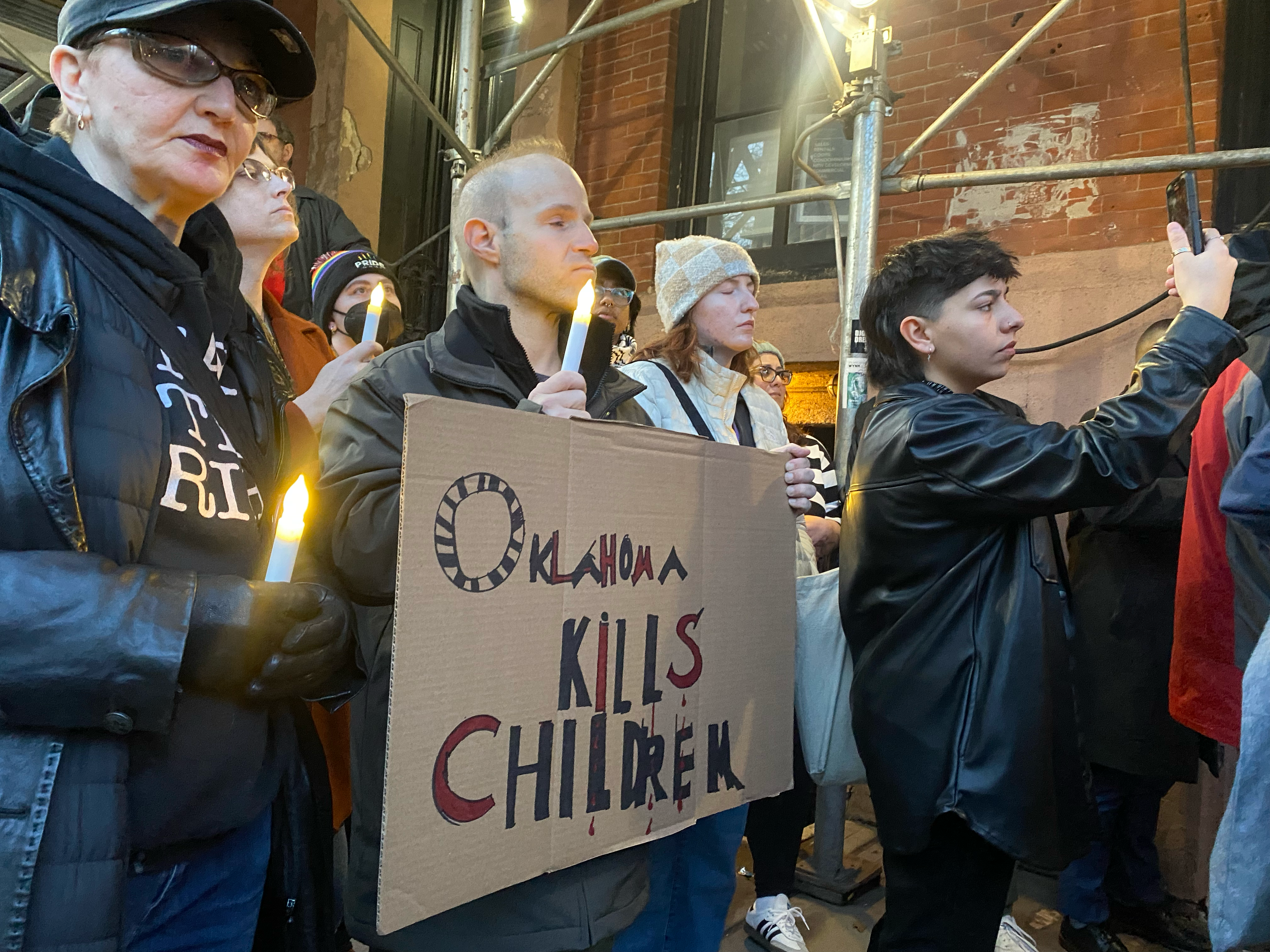 Hundreds of New Yorkers gathered for a candlelight vigil at the Stonewall Inn in the West Village on Monday to remember nonbinary Oklahoma teenager Nex Benedict