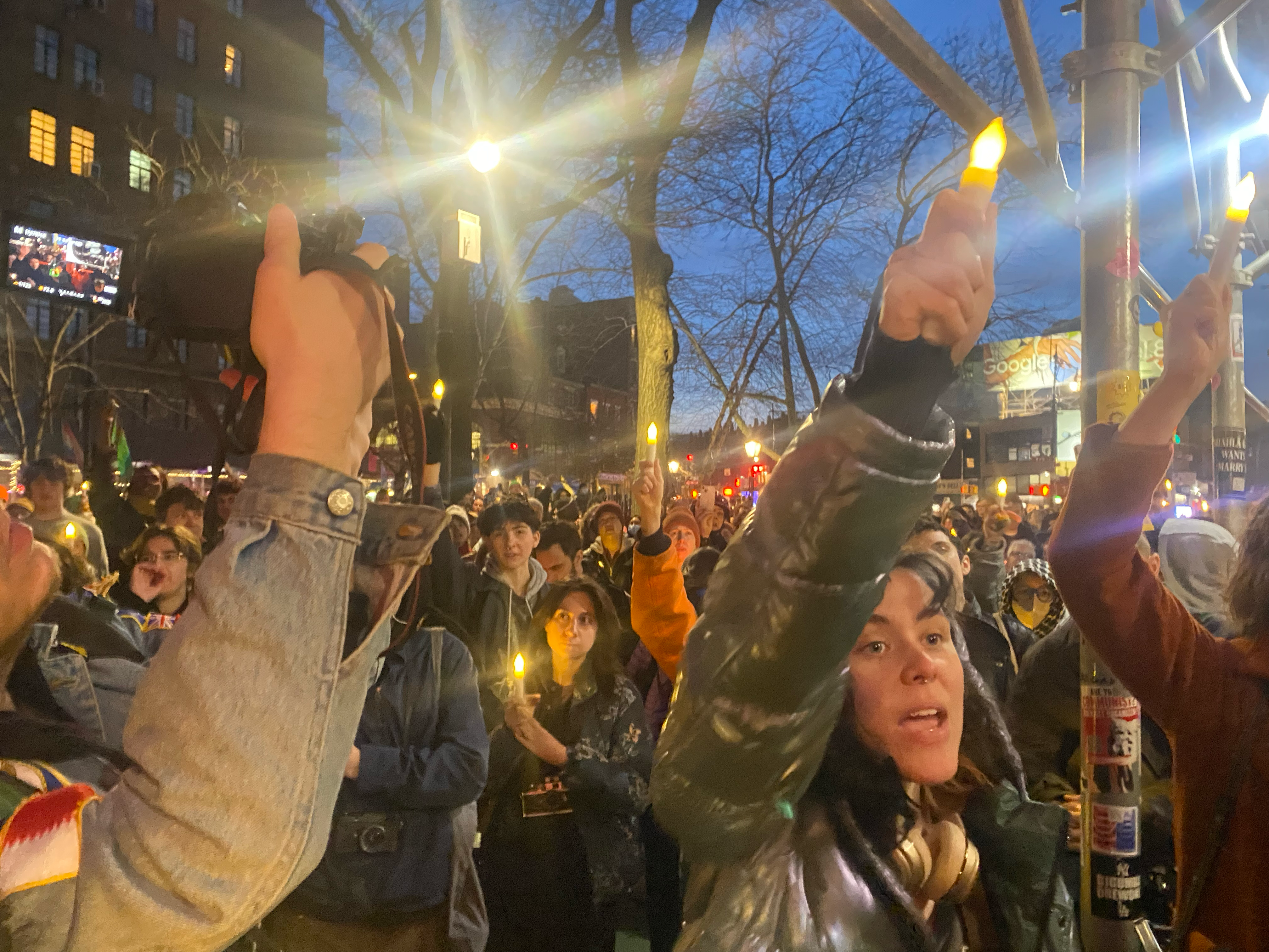 A crowd of around 500 gathered at the historic Stonewall Inn in New York to pay tribute to Nex Benedict